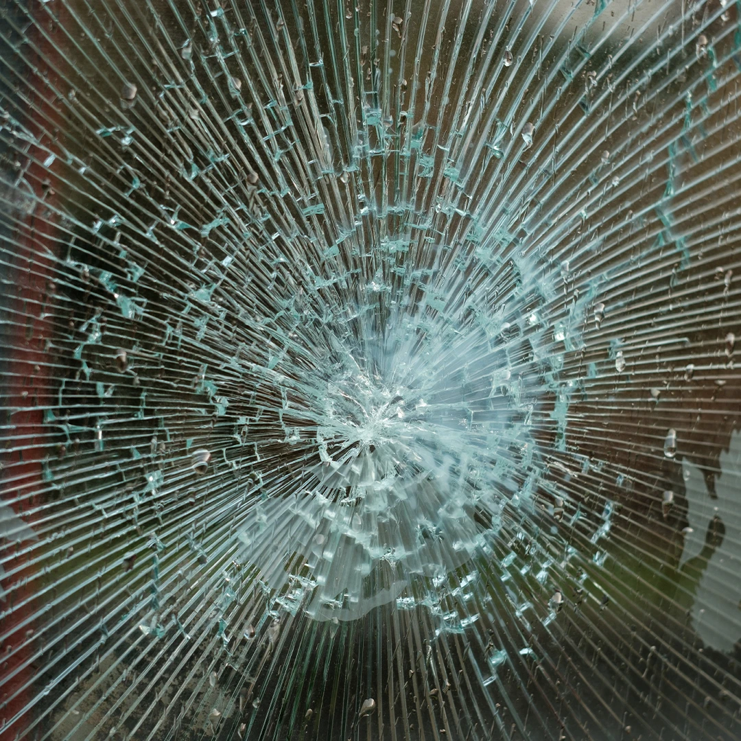 Shattered Glass Protected By Security Window Film.